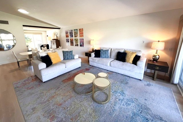 Living room with vaulted ceiling and comfortable seating for enjoying the view or TV, sofa includes a Queen Sleeper Sofa