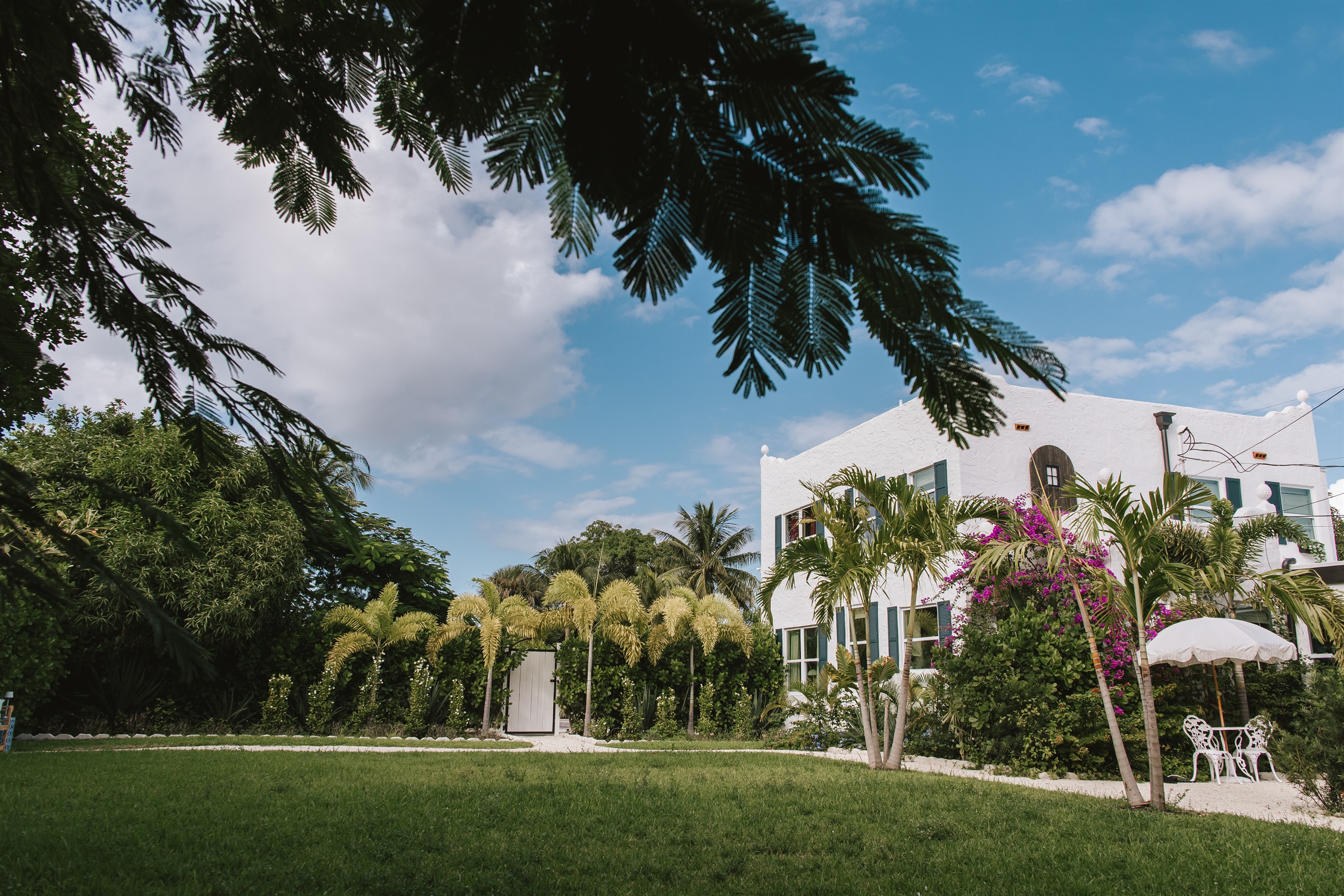 A view of the main home from across the lawn, illustrating how spacious and peaceful our grounds are.