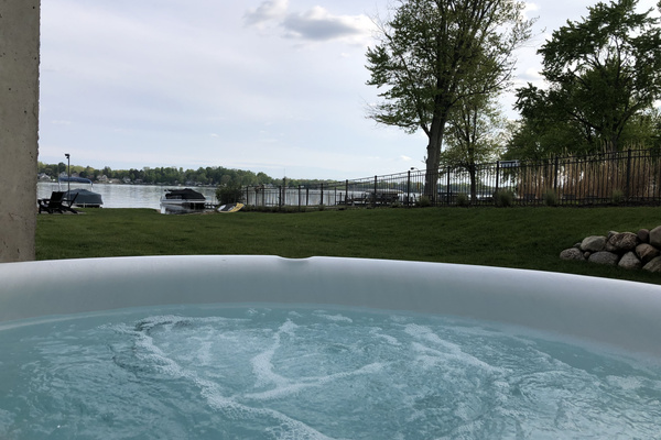 view of lake from hot tub - seats 6