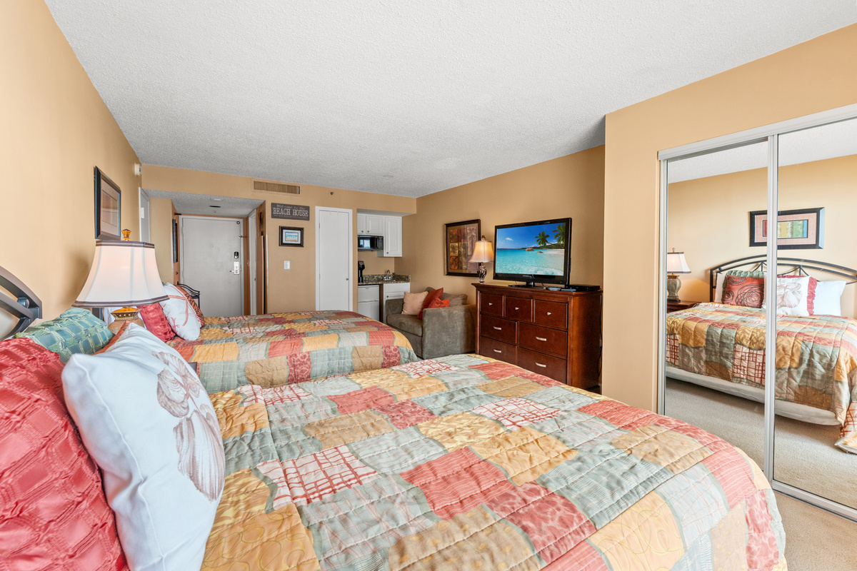 Studio with 2 queen beds, kitchenette with fridge and microwave and private balcony