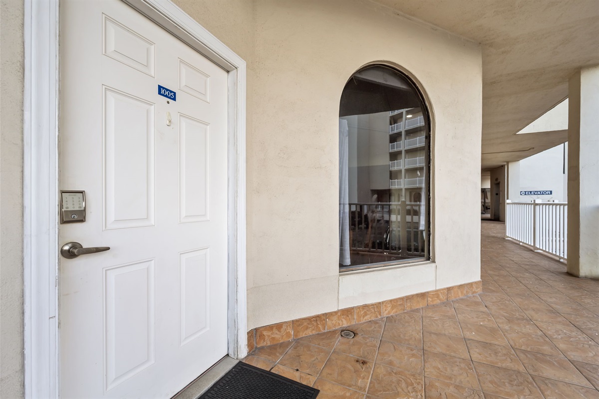 Private covered entry with easy access to the unit