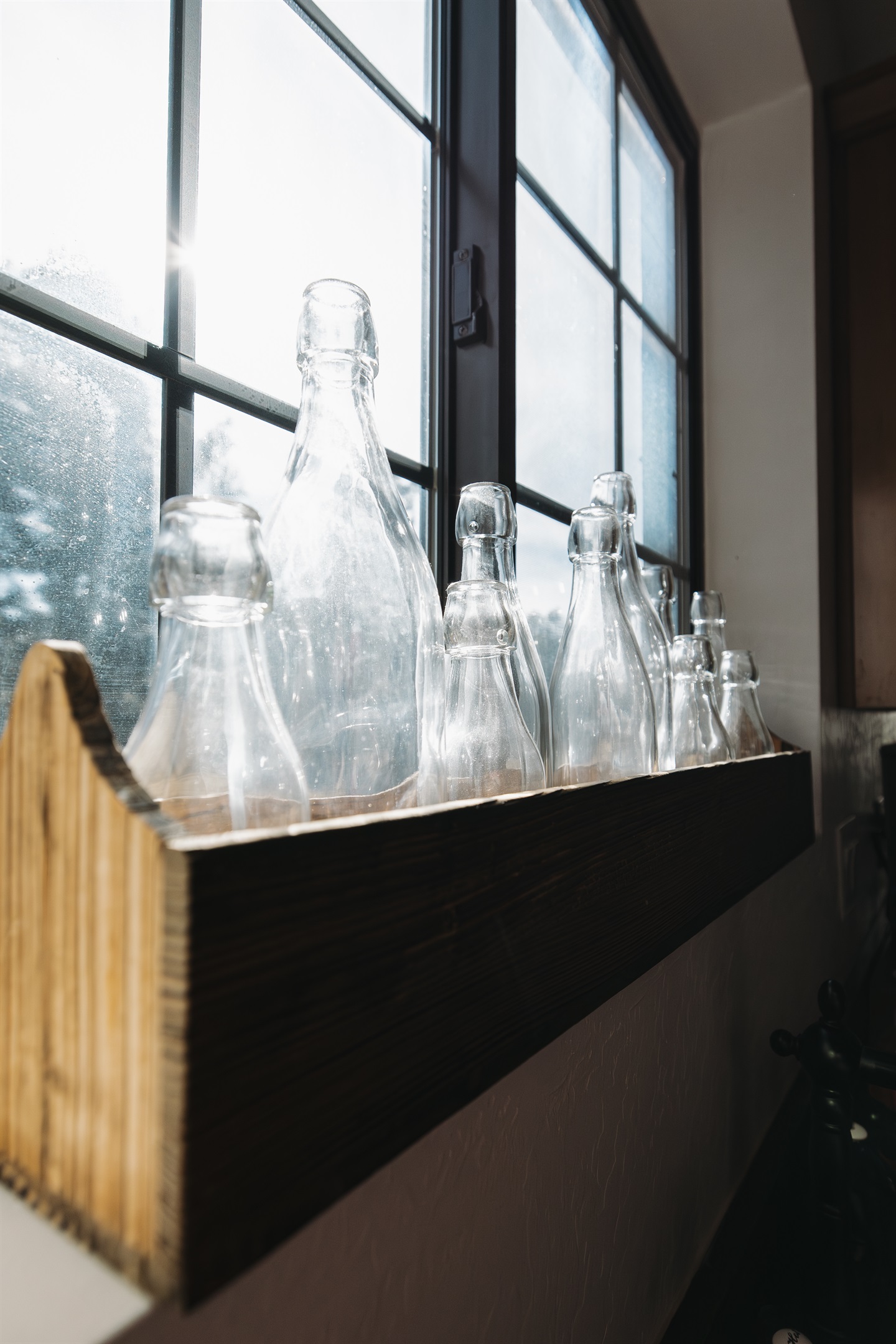 Thoughtful design details throughout—sunlit kitchen accents and curated touches that make Attiwood Ridge feel warm, intentional, and elevated.