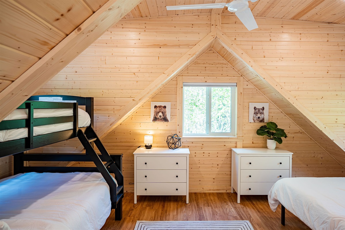 Loft area, with view of clothing storage and twin over double bunk bed