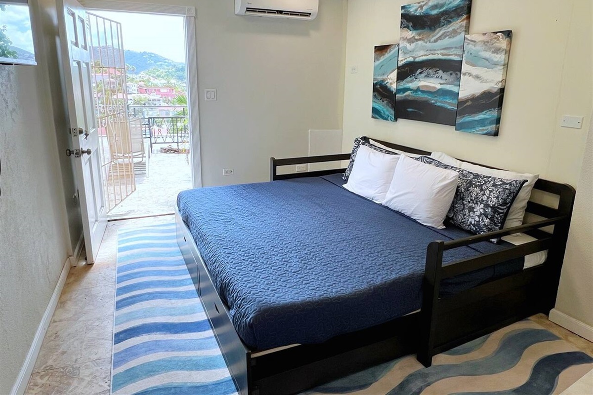 The 5th bedroom is small apartment just off of the pool deck.