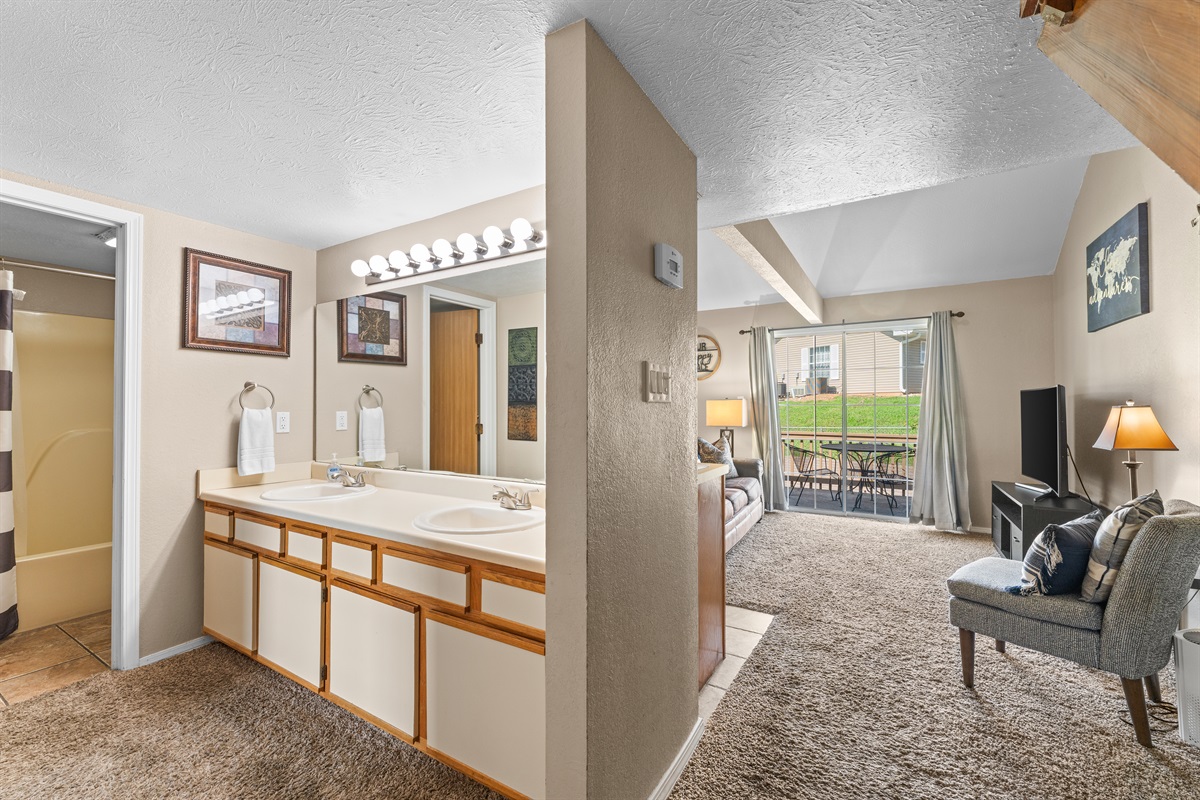 Spacious vanity room makes getting ready easy without crowding the bedroom.