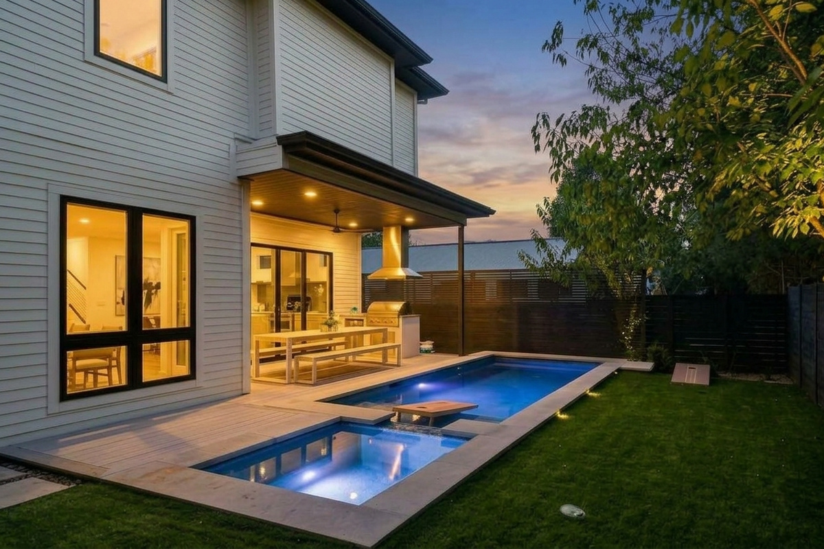 Evening ambiance sets the scene by the pool as the sun goes down.