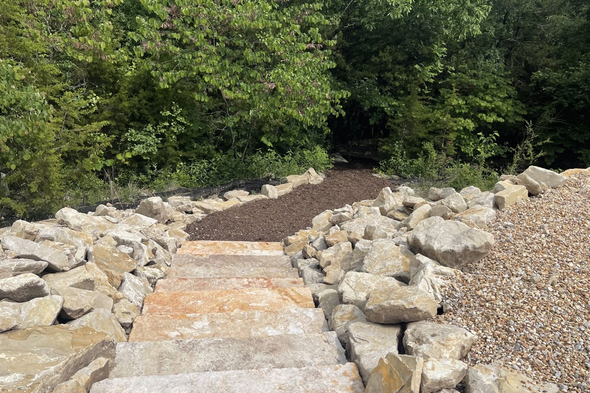 Branson Cove trailhead to lake.  House is very close to trail