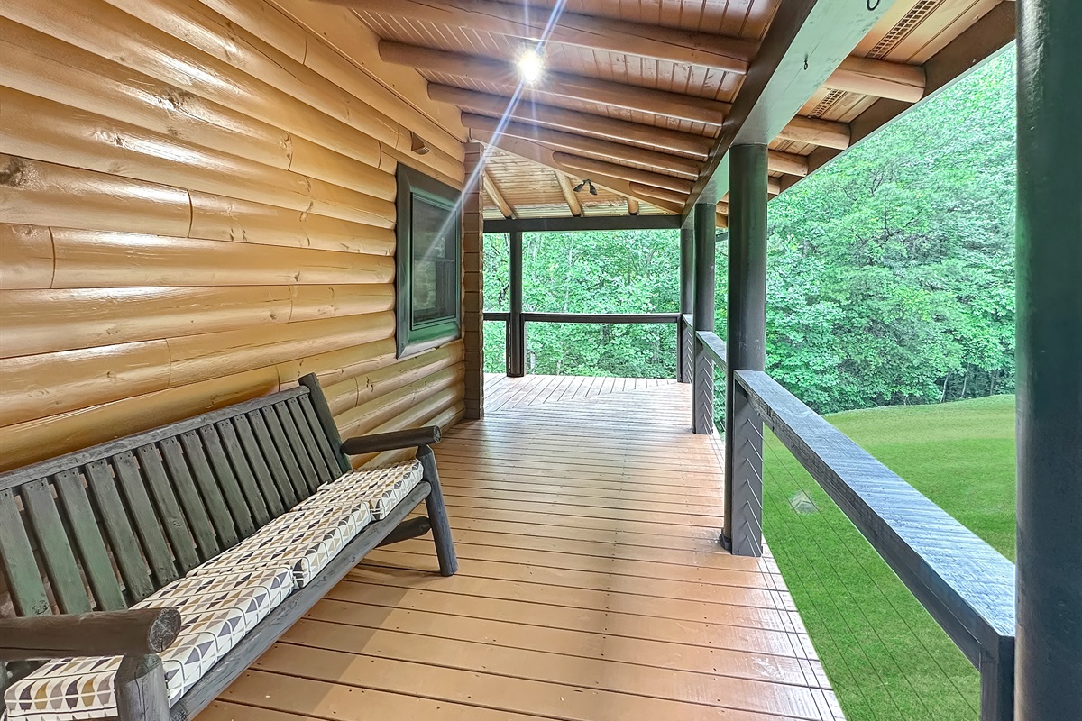 Porch: Unwind on the spacious porch with serene views of lush greenery!