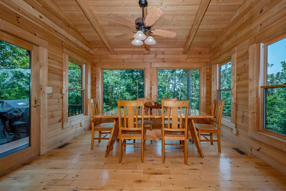 Hand crafted, live edge dining table surrounded by spectacular views!