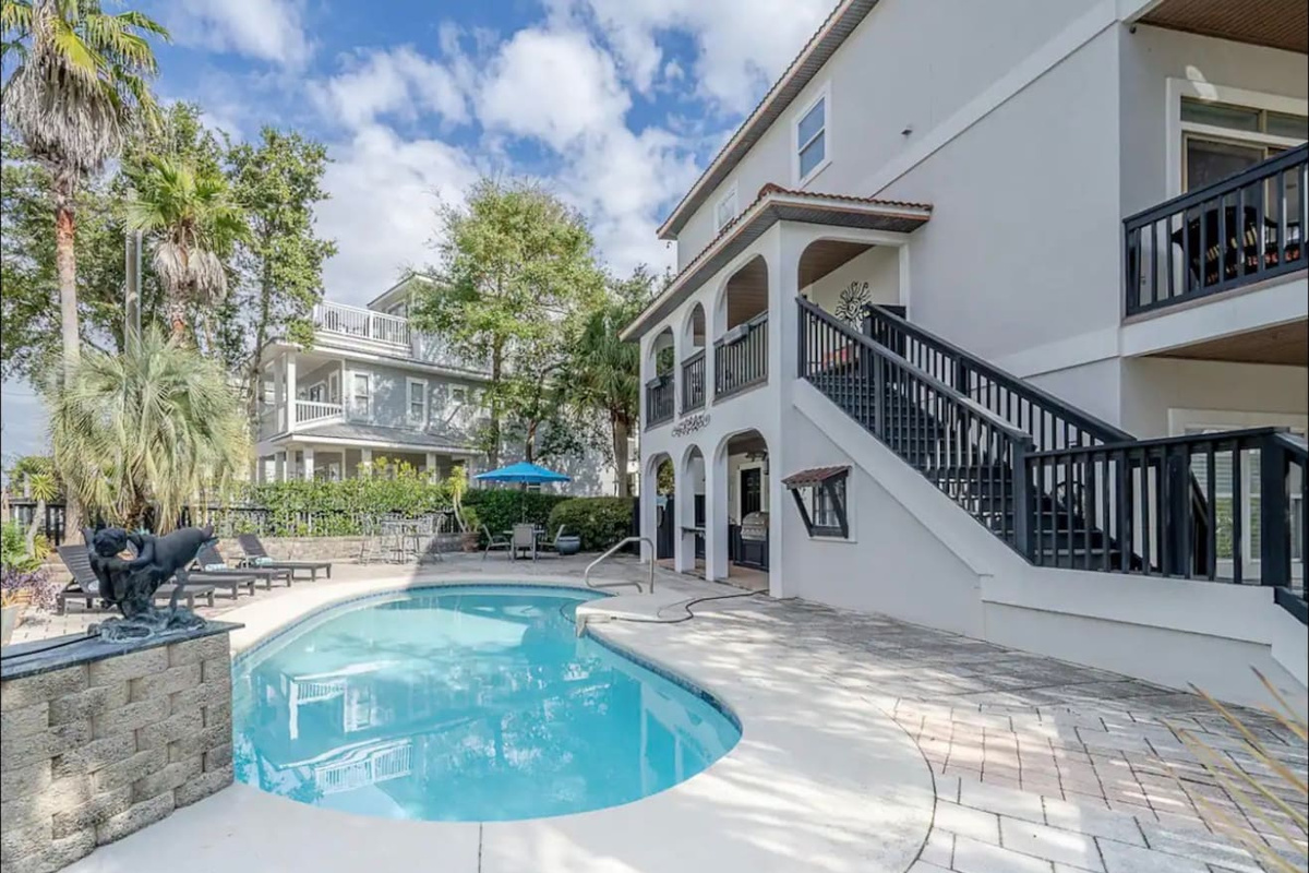 Sunlit private pool and outdoor patio area at The Copper Fin, offering the ultimate setting for outdoor entertaining and relaxation