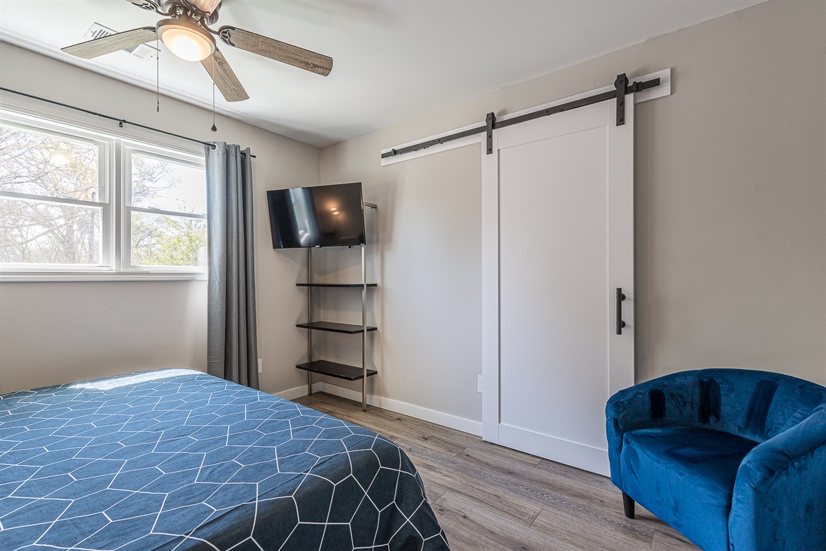 The second bedroom has shelving for your belonings