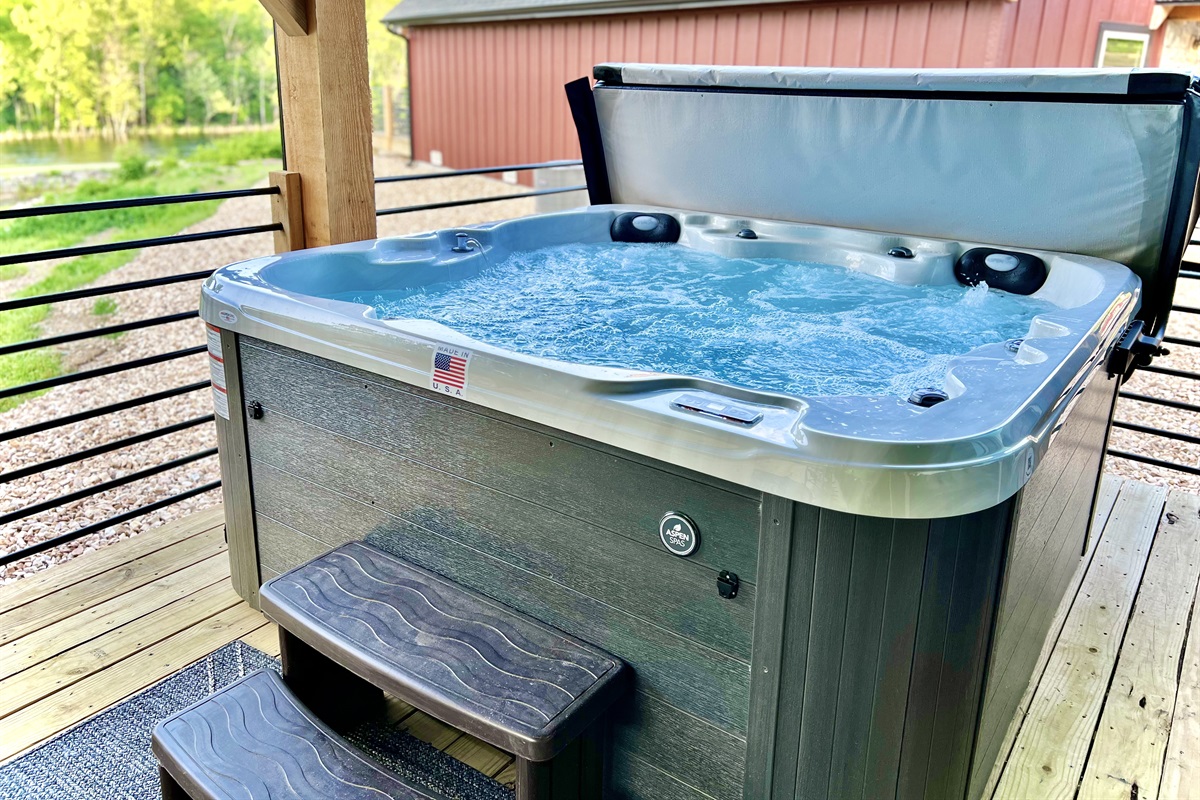 Soak in a relaxing hot tub surrounded by nature!