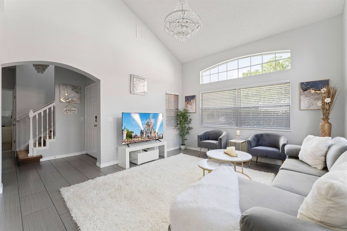 Our 4 bedroom home has a lovely natural light. The living room is open and spacious with a 58 inch ROKU Smart TV.