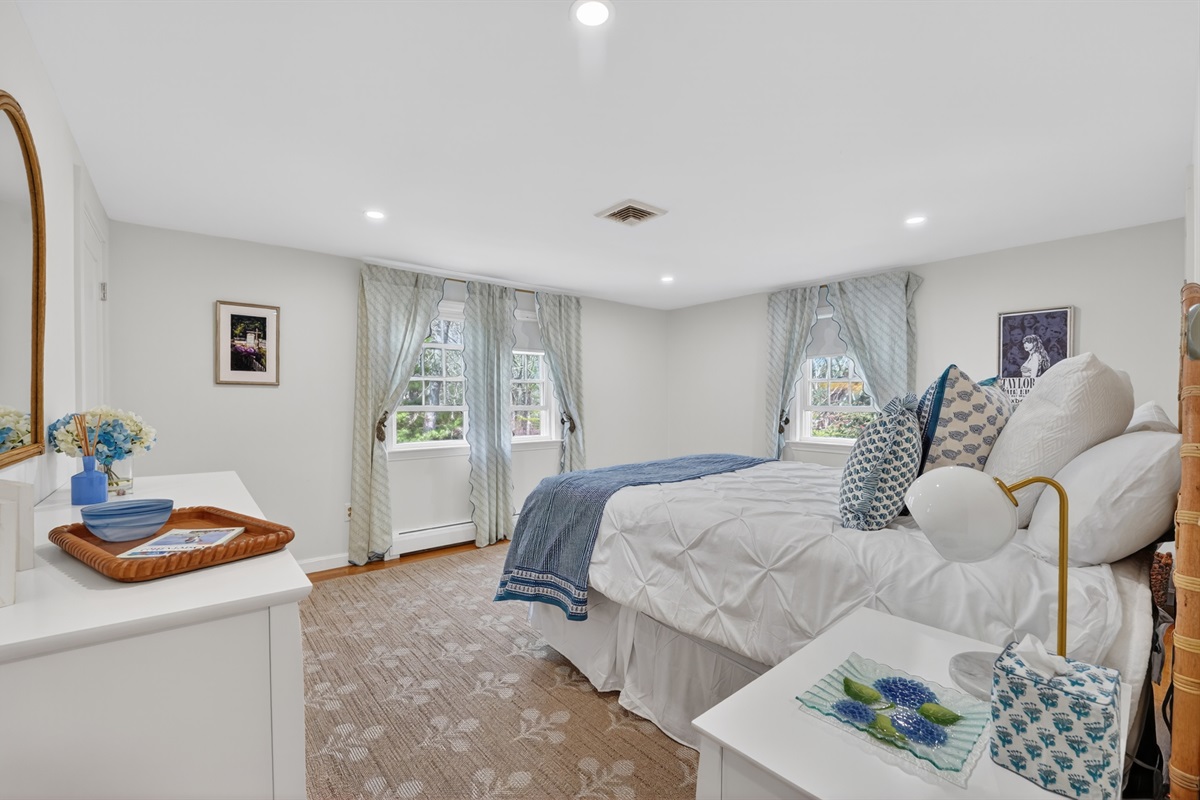 The perfect guest space featuring a snug and comfortable queen bed!