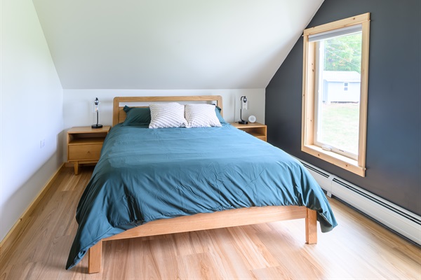 Queen bed featuring a Helix Midnight Luxe mattress for the ultimate rest