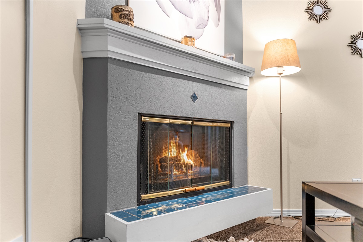 Gas fireplace while enjoying the cozy living area