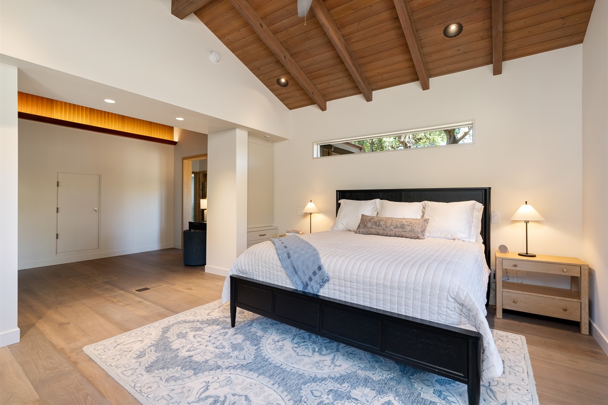 Elegant primary suite with office corner and deluxe ensuite