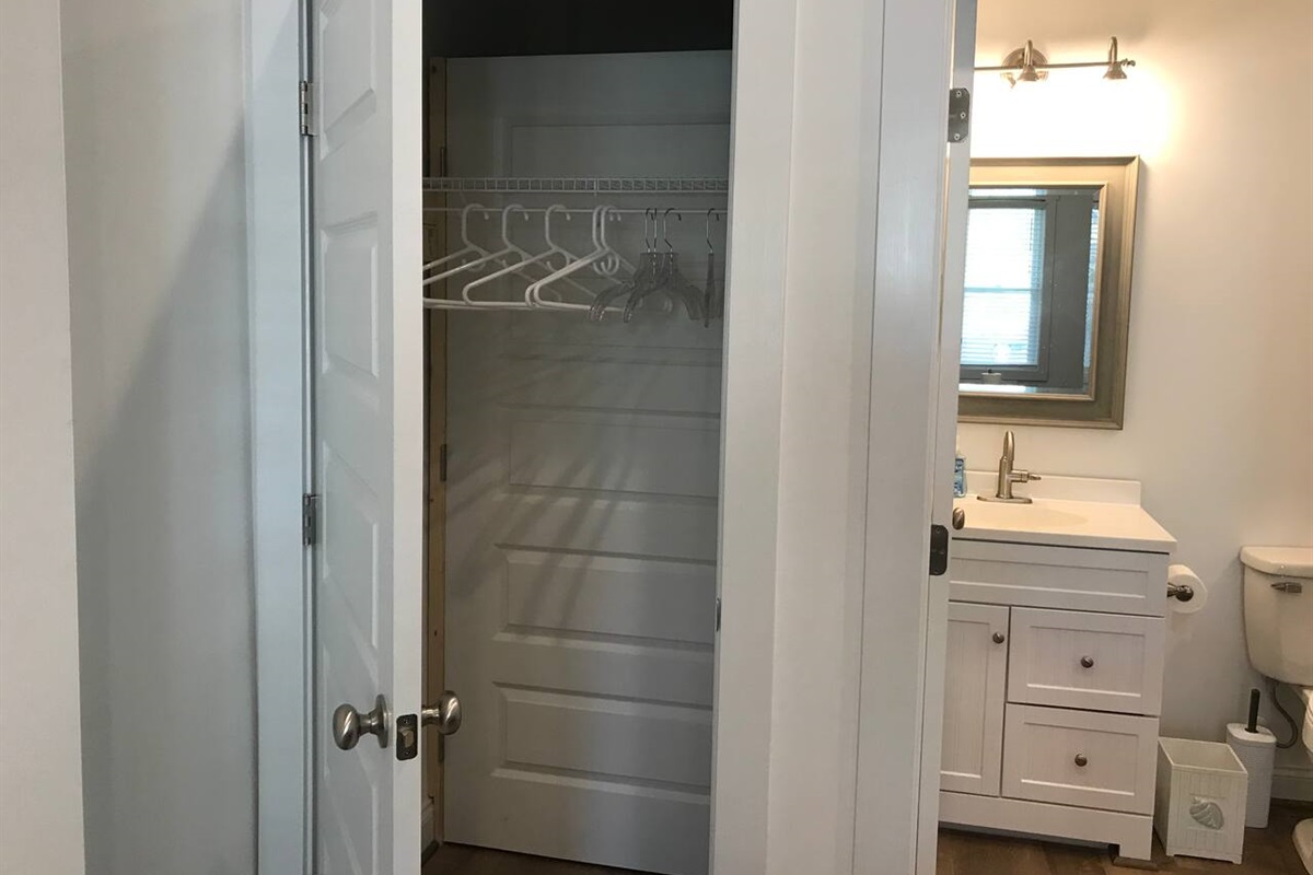Private closet for the downstairs apartment.