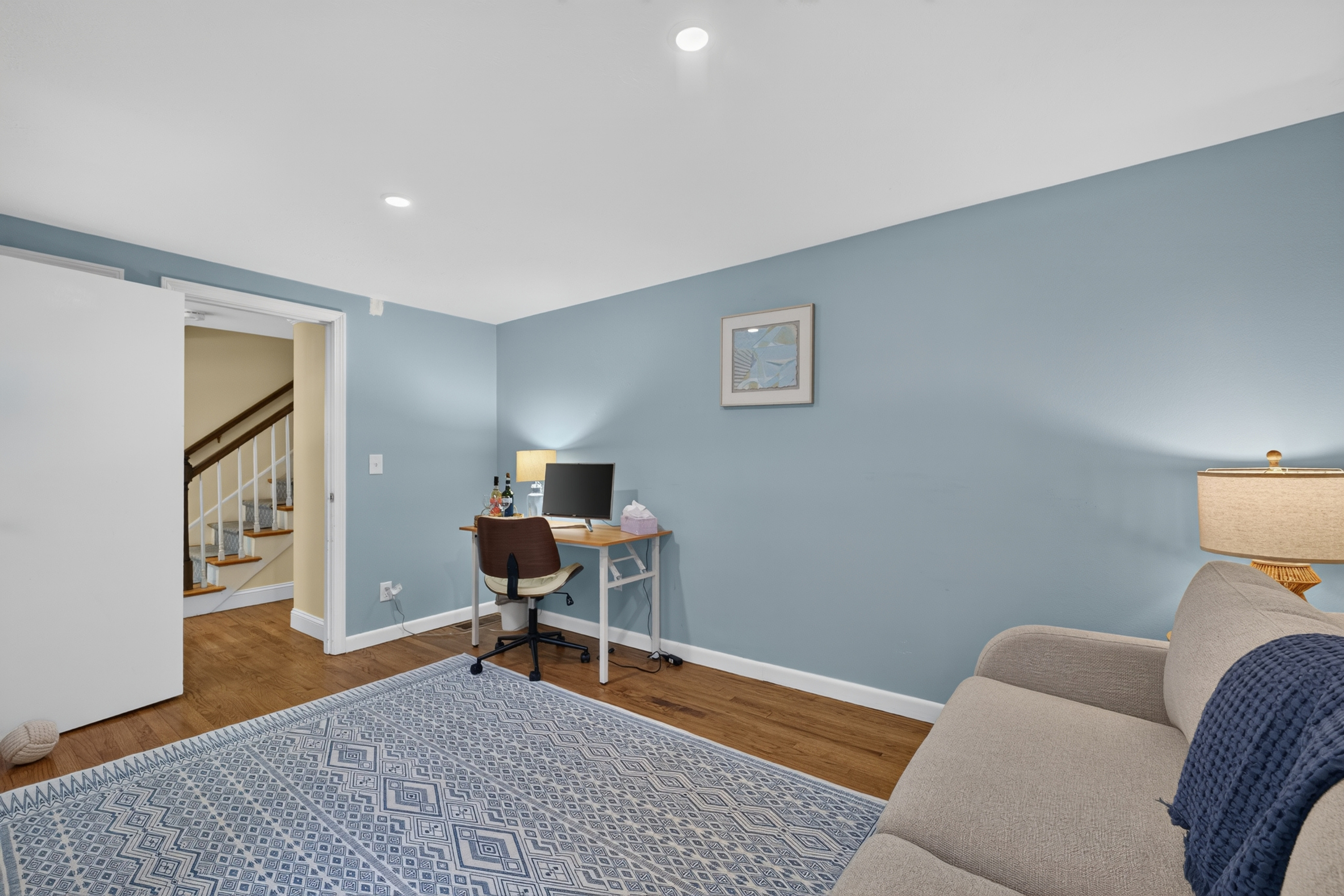 Spacious bedroom designed for both comfort and convenience.