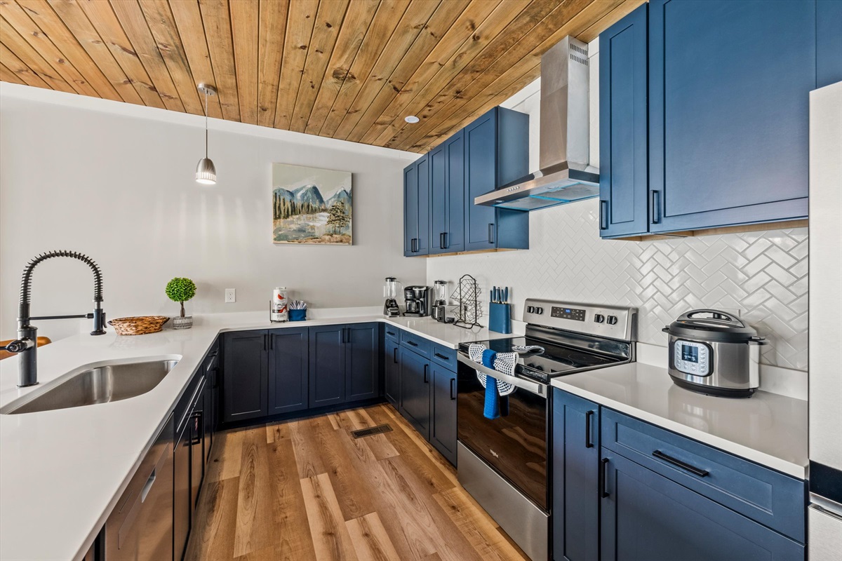 Stunning modern kitchen loaded with amenities.