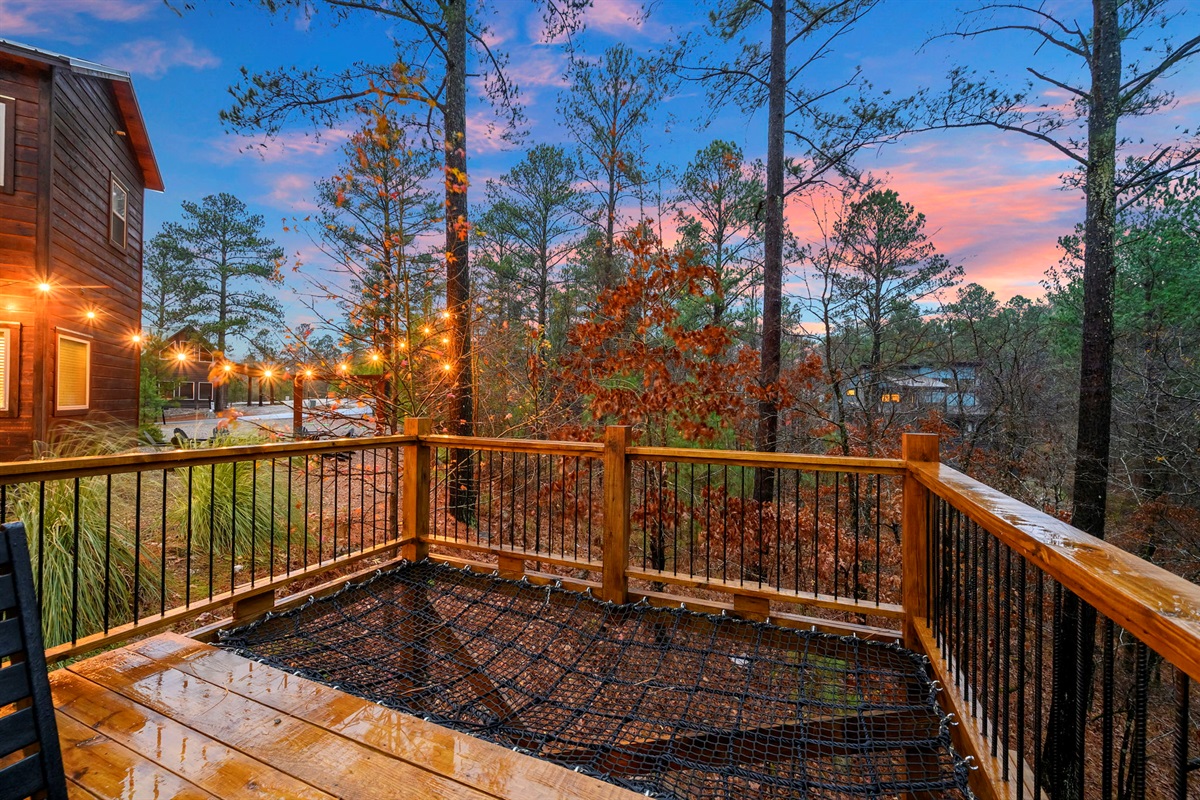 Elevated cargo net hammock for lounging and star watching. 