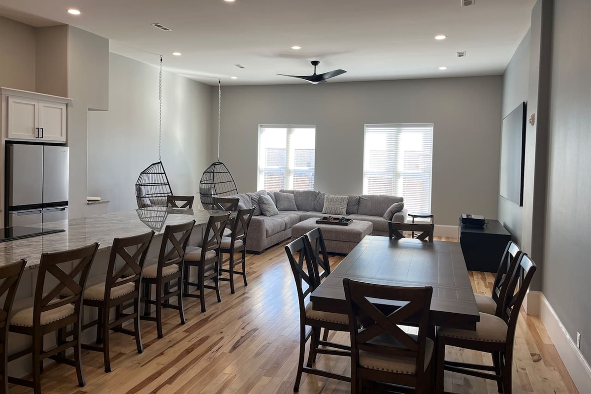 You can easily see our intention to turn this space into a virtual pace to entertain with the wide open space, 12’ ceilings and 8’ tall doors.  The dining room table seats 6 comfortably and the 14’ island offers seating for an additional 8!