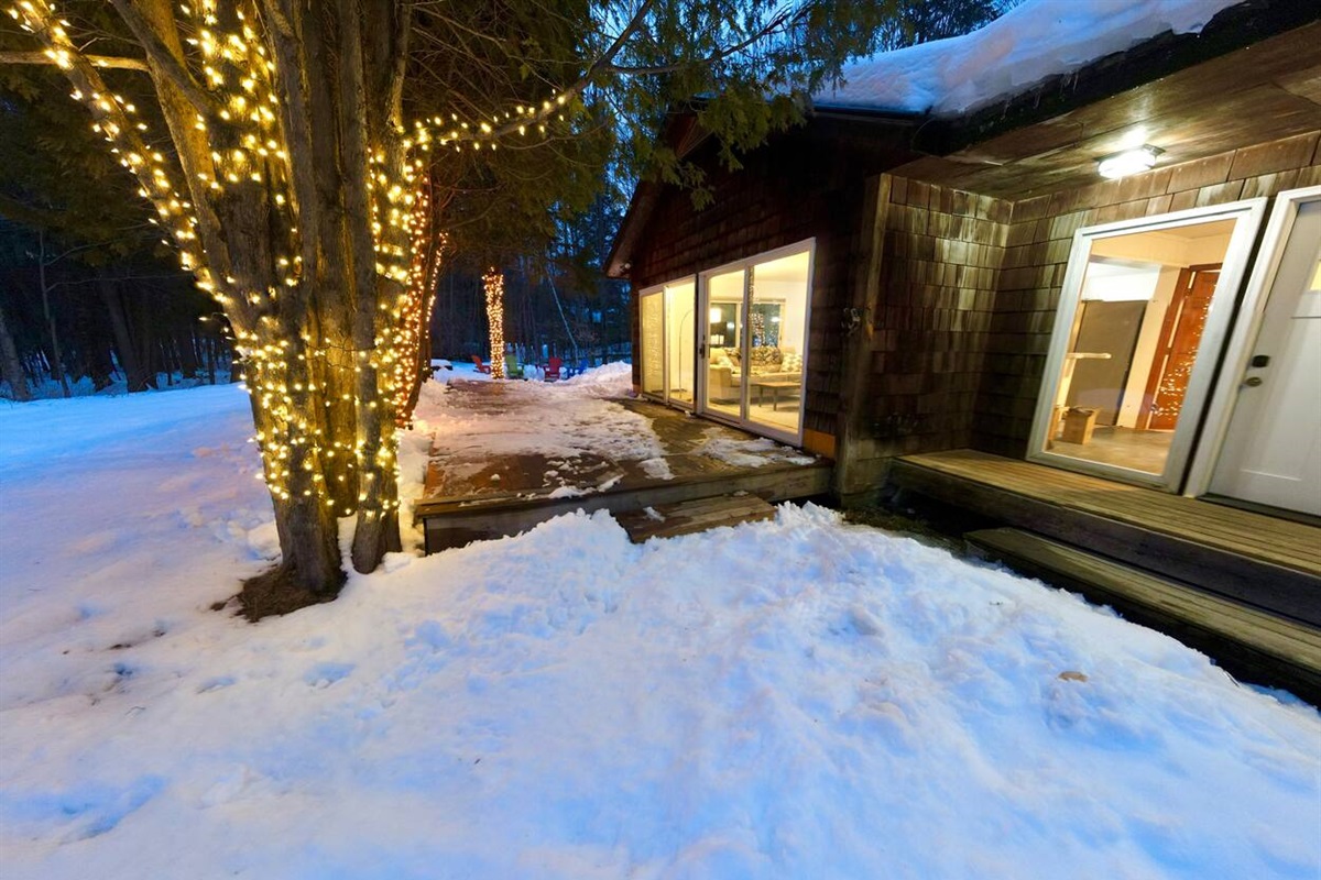 Wraparound deck with string lighting