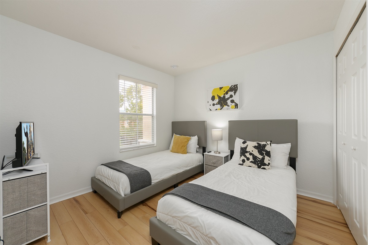 Twin bedroom at the second floor, with it's own Smart TV and closet
