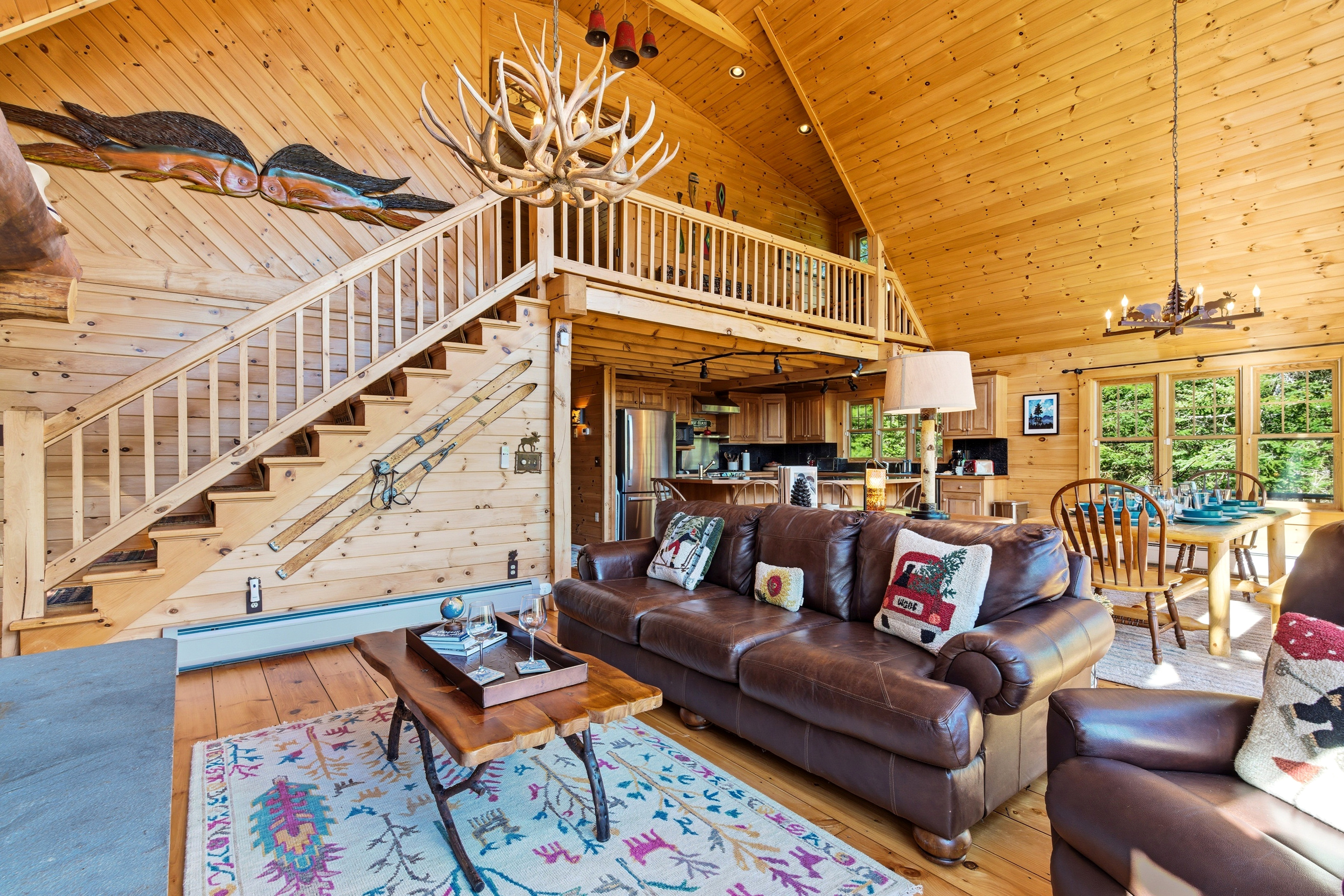 Spacious and inviting, this grand lodge-style living area is perfect for groups and family gatherings.