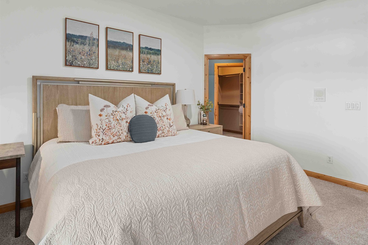 Comfortable bedroom with soft linens and a peaceful, inviting atmosphere.