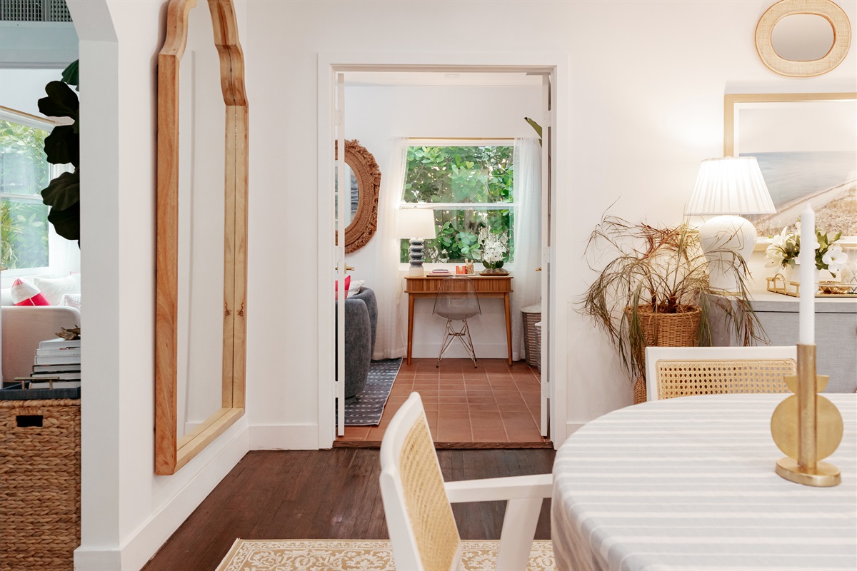 The office area is cozy yet spacious, with plenty of room for intimate conversations or working from the desk.