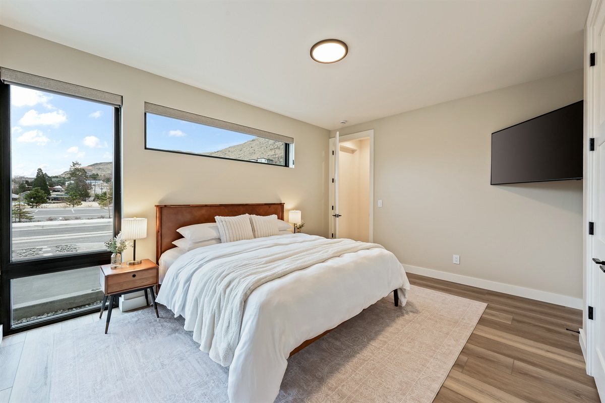 Bedroom #1 of 7 - Main floor, king bed, Smart TV, ensuite with walk in shower