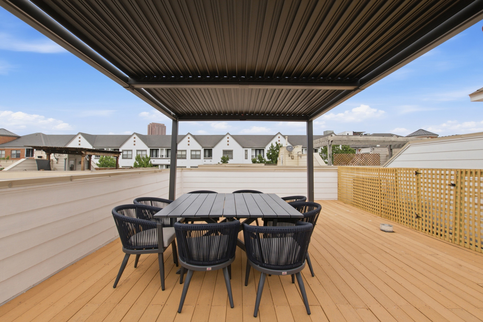 Dine al fresco with stunning views under a stylish covered patio!
