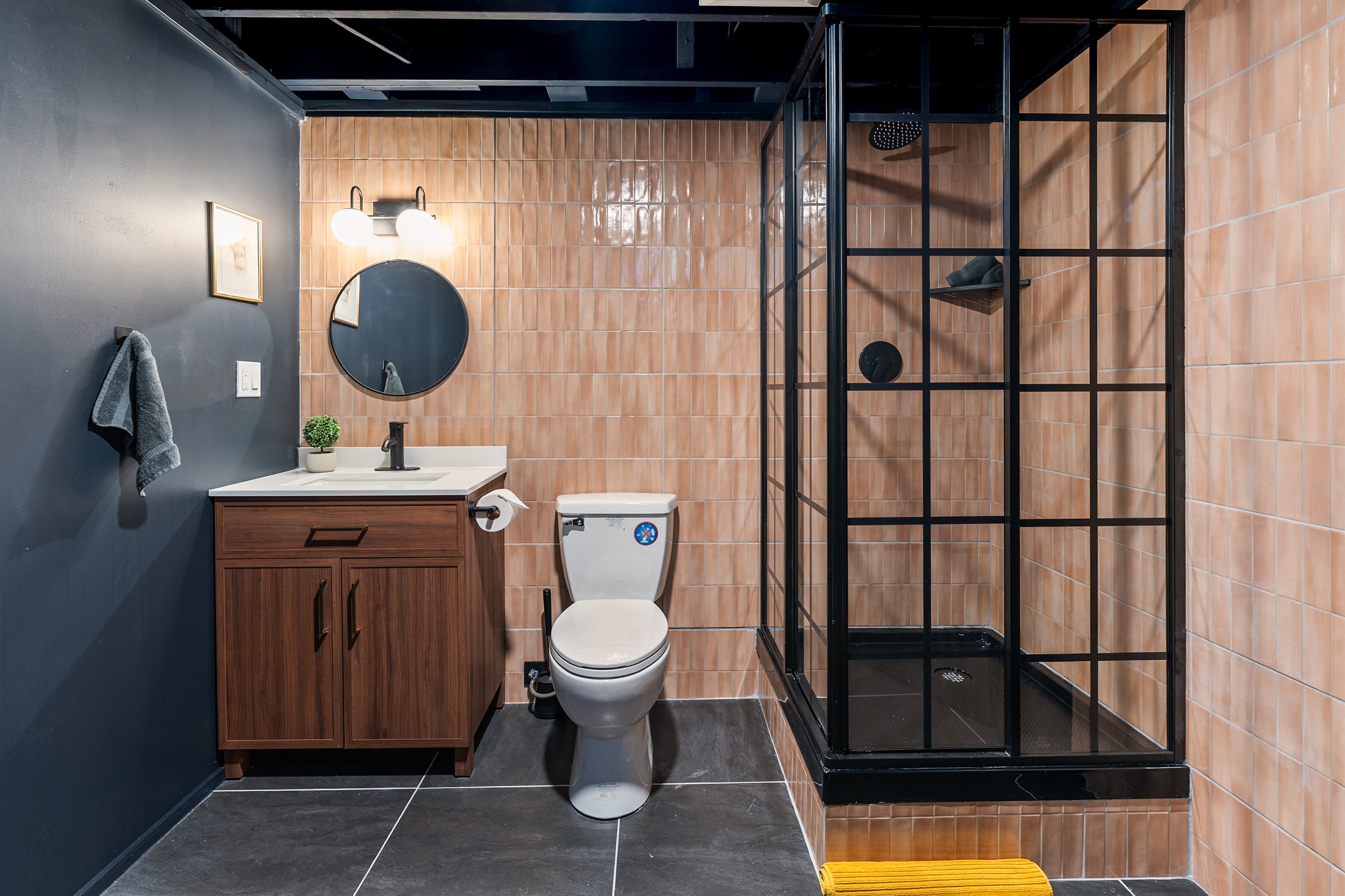 Modern bathroom with walk-in shower and clean, updated finishes for a spa-like experience.
