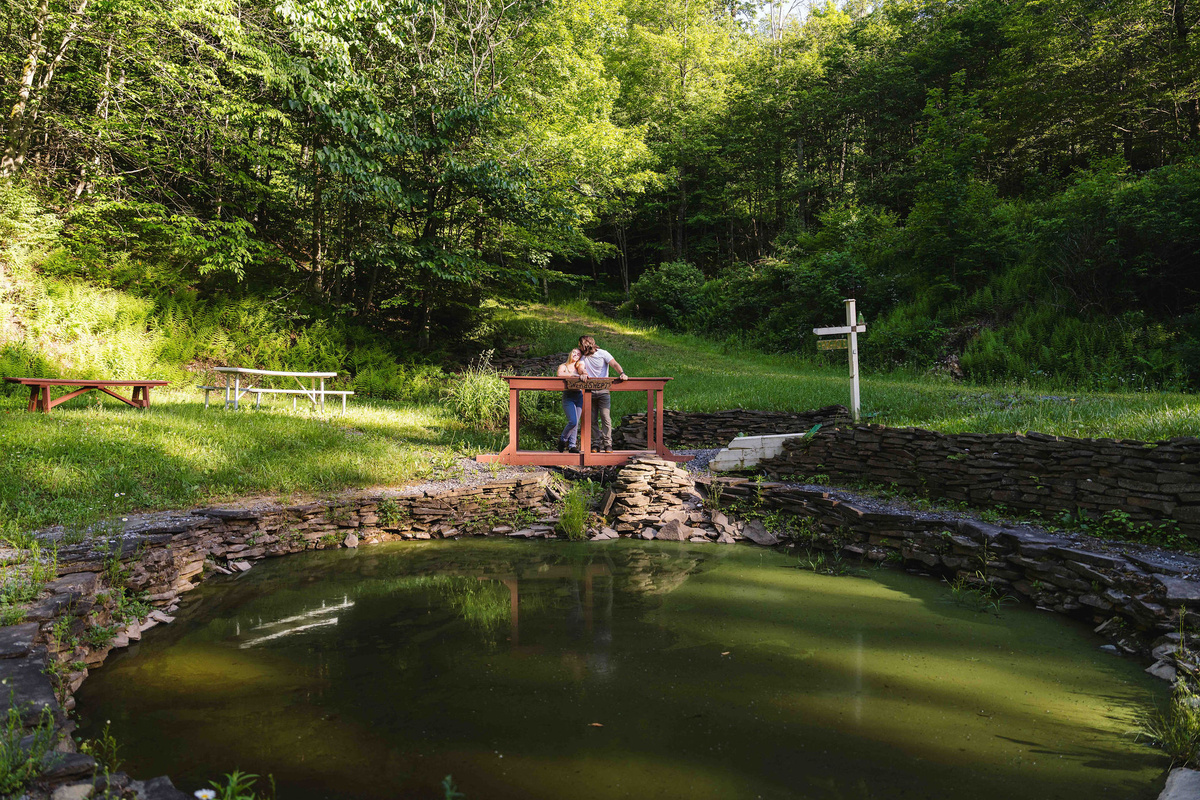🐟 A peaceful stone bridge over the on-property pond.