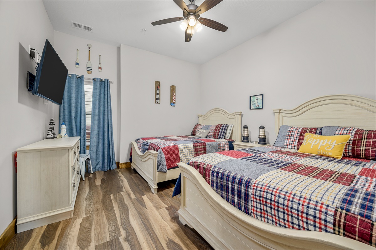 Lower level: Prince Edward Island room with 2 queen beds and ensuite bathroom