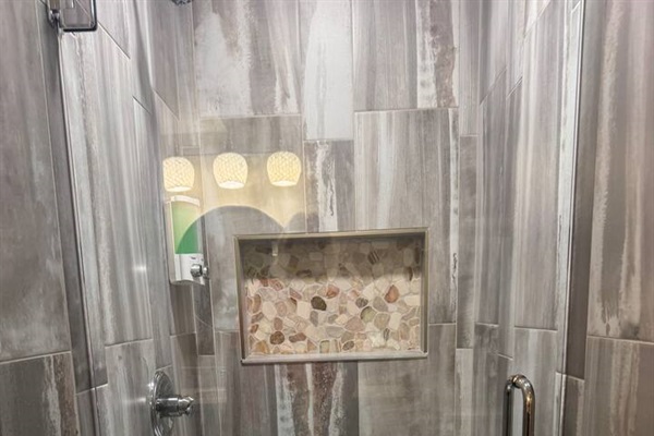 Lower level walk-in shower