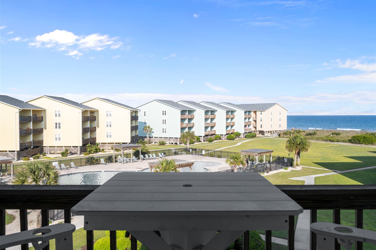 Bird&rsquo;s Nest: balcony views over pool and ocean just steps from private beach access
