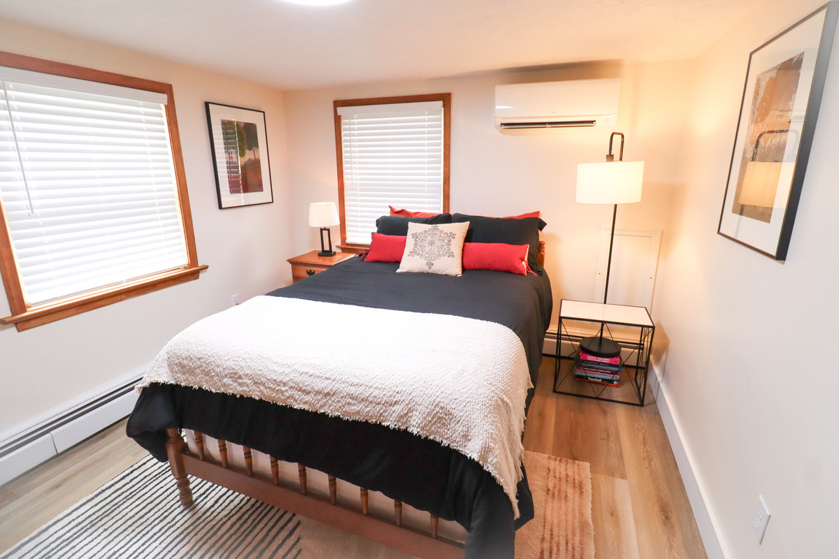 Comfortable Full bedroom designed for a relaxing night's sleep.