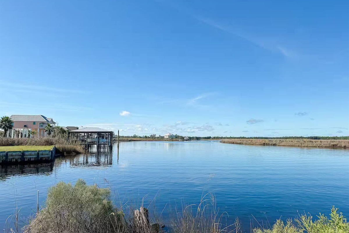 Beautiful waterway surrounded by natural marshland, offering peaceful views and a true coastal retreat feel.