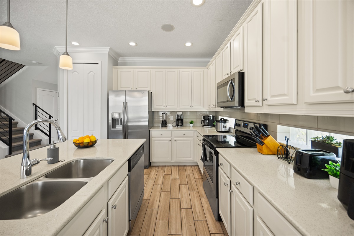 Our full kitchen is equipped with the common items that you need to cook on vacations, like pot, pans, trays, plates, etc.