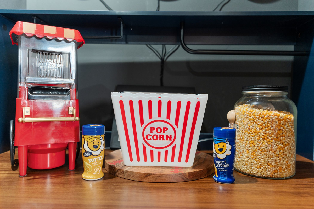 Enjoy cozy movie nights complete with popcorn (complimentary for our guests)