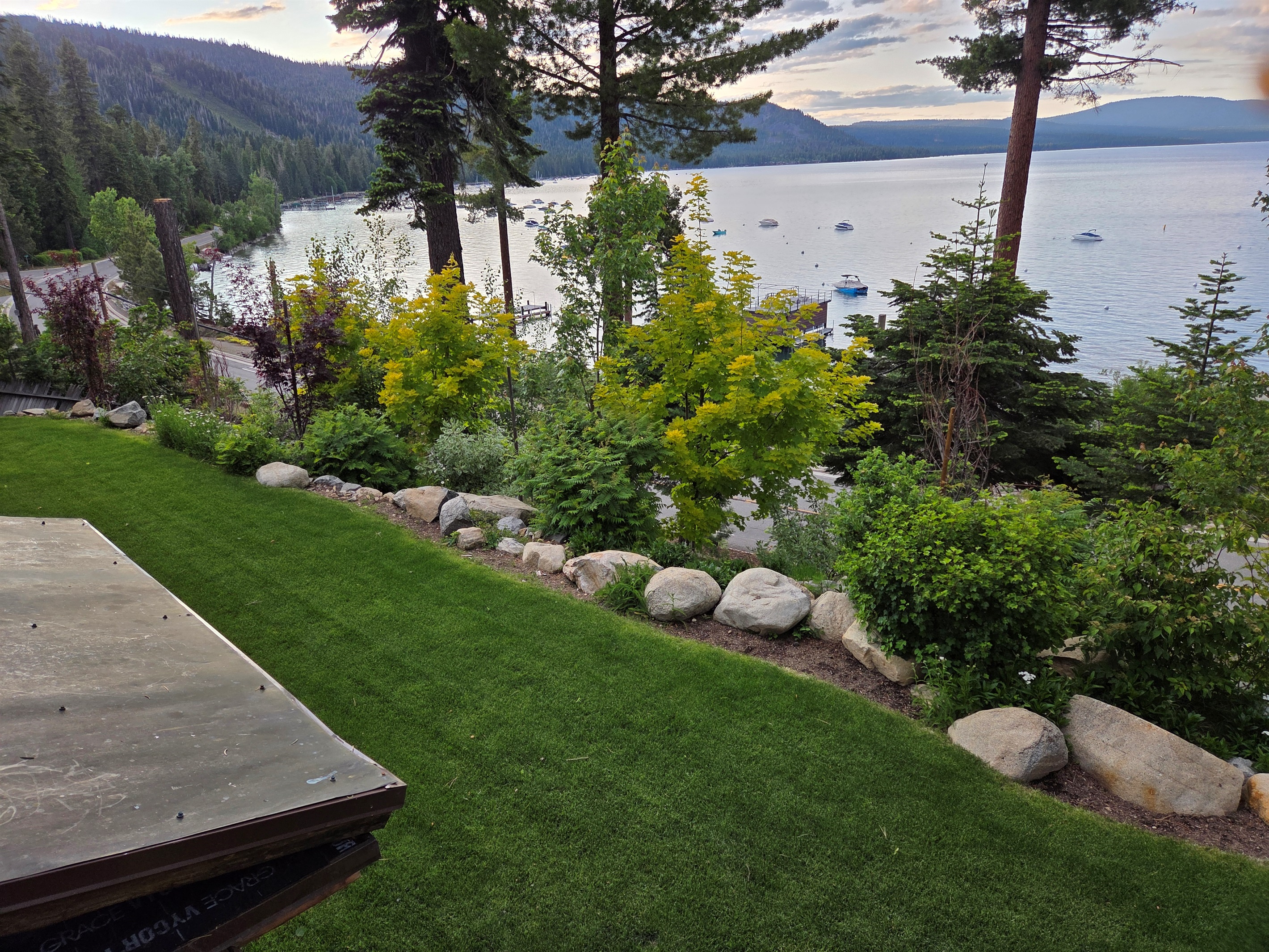 Our lawn area facing the lake.  This will most likely be covered by snow in the winter and not be green in the in between seasons, but this what it looks like in the summer!