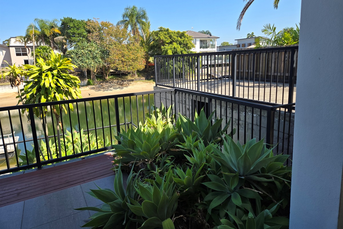 Outdoor area at rear of property with private jetty