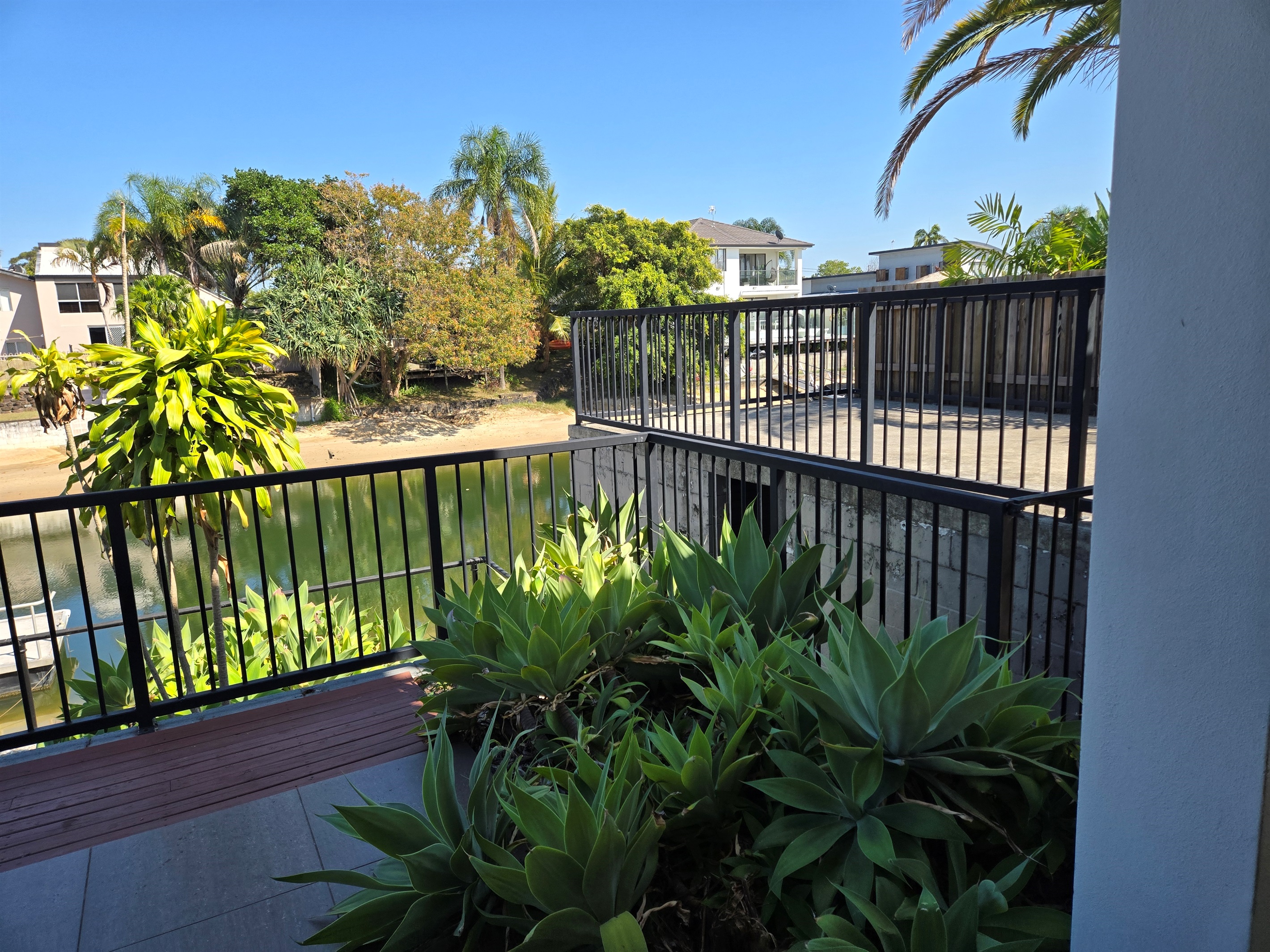 Outdoor area at rear of property with private jetty