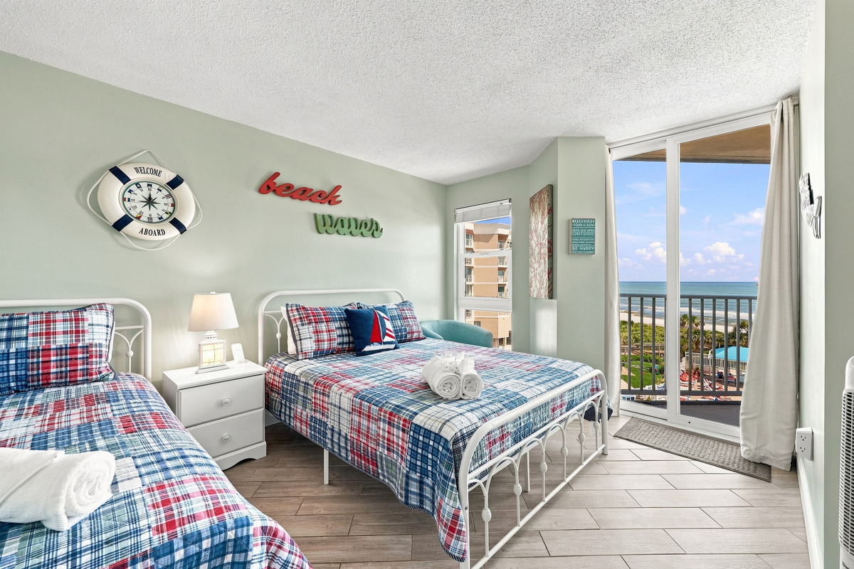 Perfect for family or friends, this inviting coastal retreat includes two beds, fresh tile flooring, and beautiful natural light.