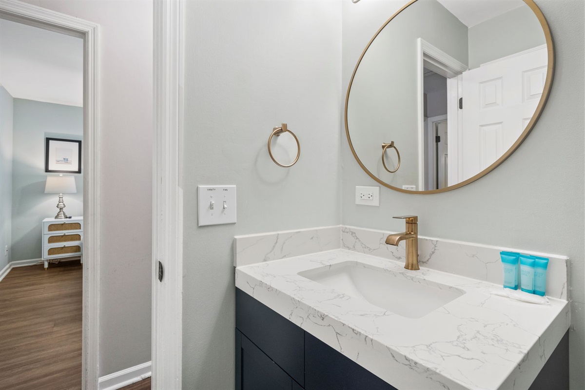 Hallway Bathroom 2 With Tub and Shower Combo | Shared by Bedroom 2 and 4 | IOP Escapes Beach Blessing | 3705 Hartnett Blvd, Isle of Palms, SC