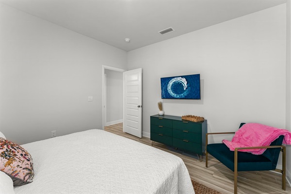 Use the dresser to store clothes or take advantage of the oversized closet