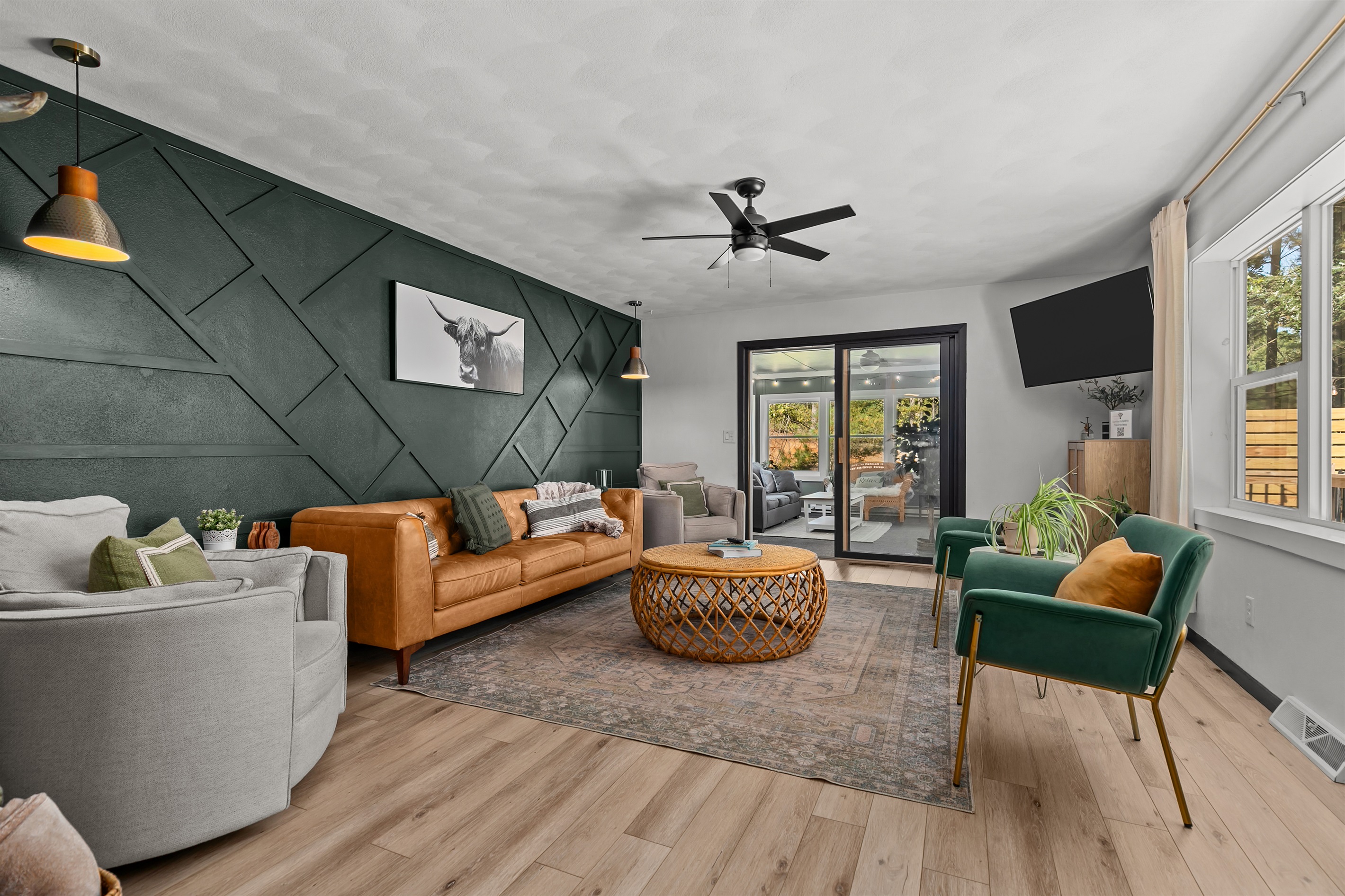 After a day of lake adventures, guests love gathering in the living room—sinking into the cozy sofa or kicking back in one of the two recliners for a relaxing evening together