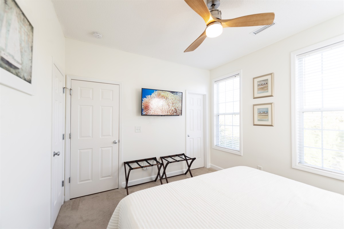 [Bedroom] - We offer our guests luggage racks, to put away your suitcases, and enjoy the extra space to move around, without having to bump into furniture.